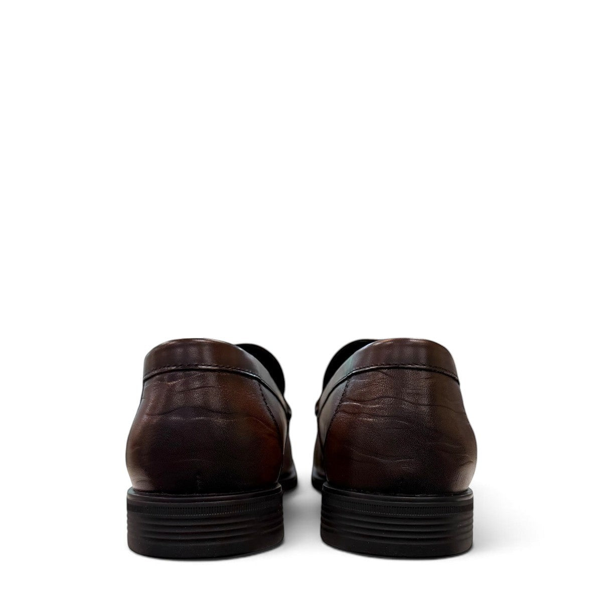 Sina Footwear dark brown genuine leather loafer with a classic slip-on design and durable rubber outsole.
photo of the back side
