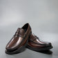 Sina Footwear dark brown genuine leather penny loafer with a classic silhouette and durable rubber outsole.
photo of the  front side