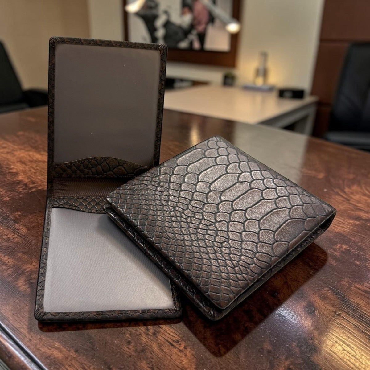 Sina Footwear dark brown genuine leather bi-fold wallet with embossed crocodile texture and multiple card slots.