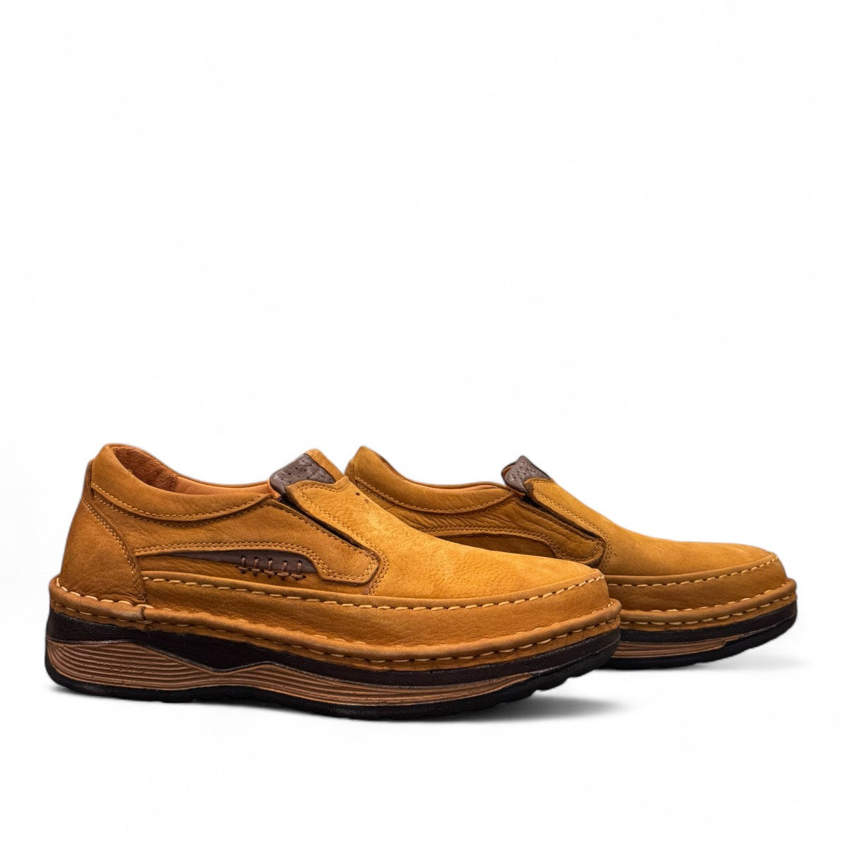 Sina Footwear Datam brown men's slip-on shoes featuring premium leather upper, leather lining, and rubber outsole. Photo of side views.