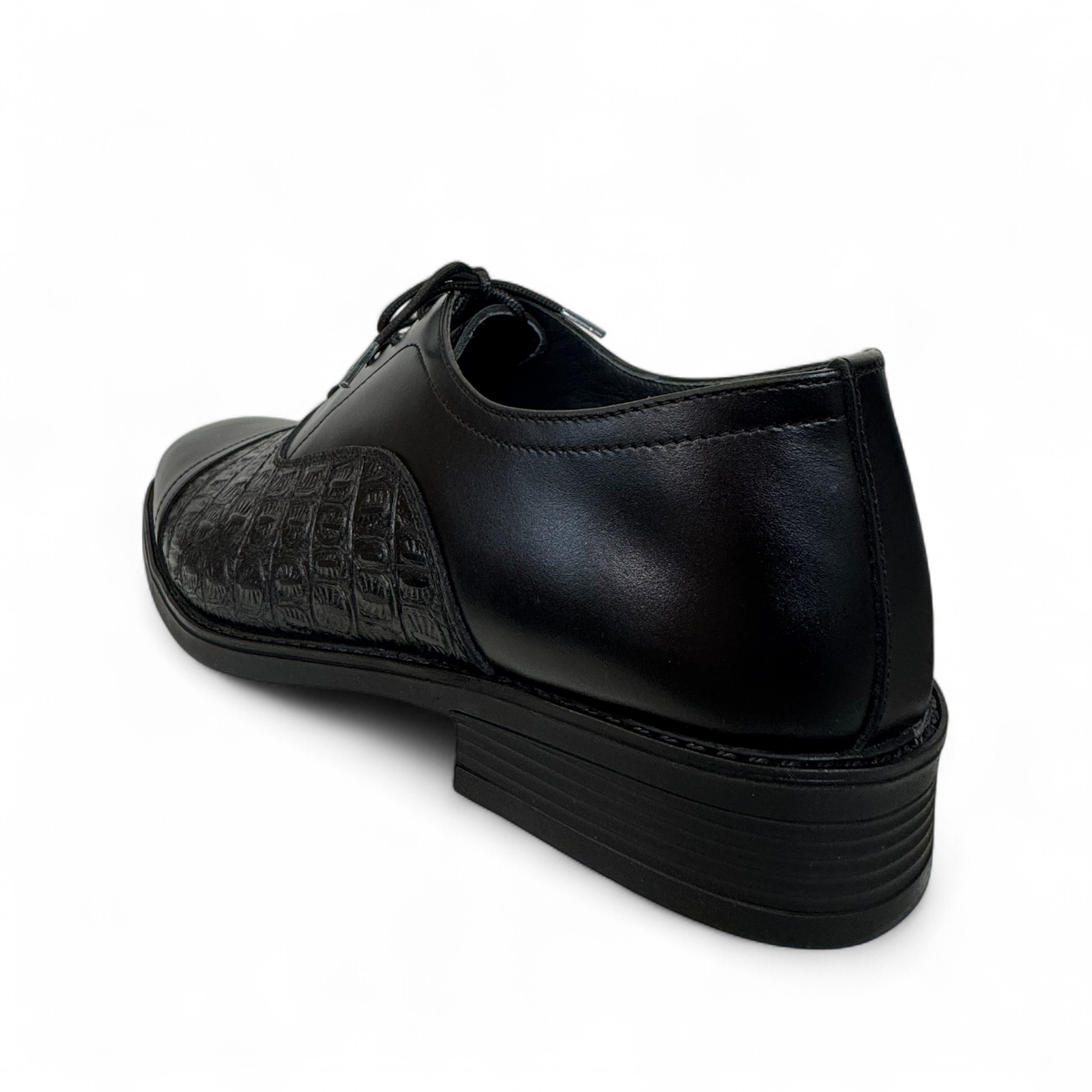 Sina Footwear Dragon black patent leather oxford shoe with textured side panel and handmade stitching detail. Photo of back side view.
