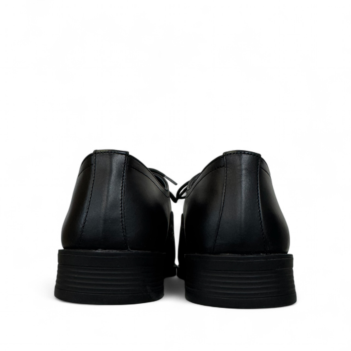 Sina Footwear Dragon black patent leather oxford shoe with textured side panel and handmade stitching detail. Photo of back view.