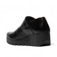 FLY LONDON Vari188Fly burn black leather wedge shoes with velcro strap and rubber sole.
photo of the back side
