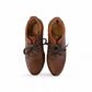 Sina Footwear Gilan brown leather lace-up shoe with textured upper, handmade stitching, and durable rubber sole. Photo of the soles.
