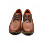 Sina Footwear Gilan brown leather lace-up shoe with textured upper, handmade stitching, and durable rubber sole. Photo of upper view.