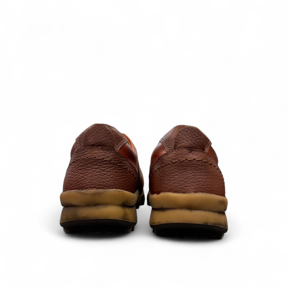 Sina Footwear Gilan brown leather lace-up shoe with textured upper, handmade stitching, and durable rubber sole. Photo of back view.