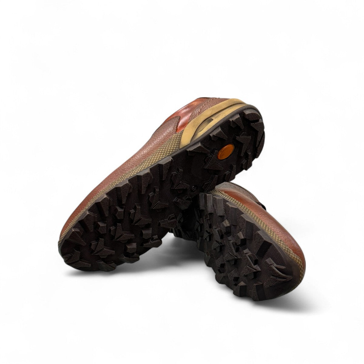 Sina Footwear Gilan brown leather lace-up shoe with textured upper, handmade stitching, and durable rubber sole. Photo of bottom view.