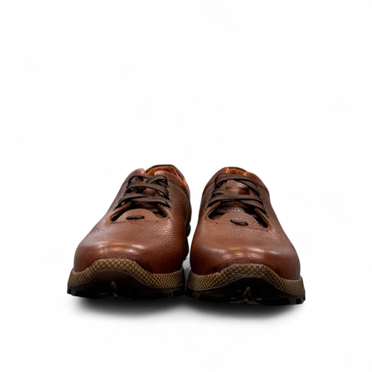 Sina Footwear Gilan brown leather lace-up shoe with textured upper, handmade stitching, and durable rubber sole. Photo of front view.