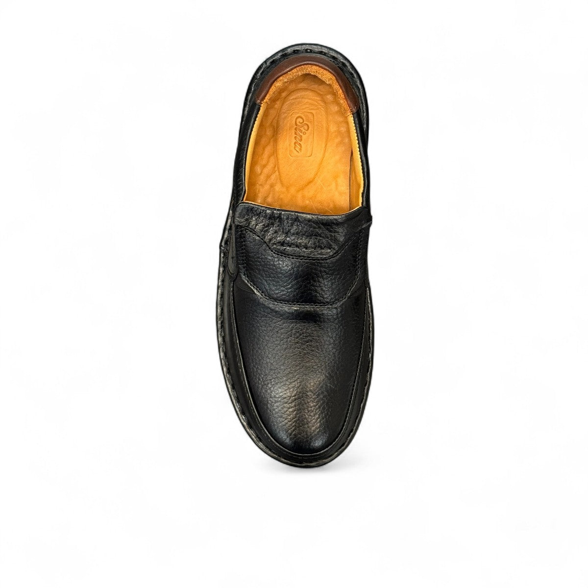 Sina Footwear Kiarash black genuine leather slip-on shoes with handmade stitching and a durable textured sole. Photo of the sole.
