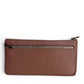 Sina Footwear genuine leather wallet in a dusty rose color with a zippered pocket on the front.