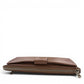 Sina Footwear genuine leather wallet in a taupe color with a bi-fold closure and zip-around compartment.