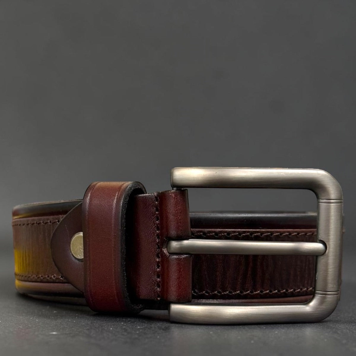Sina Footwear men's dark brown genuine leather belt with a sleek, modern silver buckle. Smooth finish.