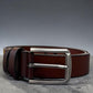 Sina Footwear men's dark brown genuine leather belt with a sleek silver buckle. Smooth finish, perfect for formal or everyday wear.