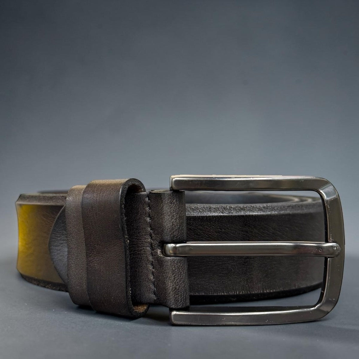 Sina Footwear men's dark brown genuine leather belt with a sleek silver buckle. Smooth finish.
