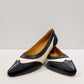 Sina Footwear navy blue and off-white leather pumps with brogue detailing, pointed toe, and low block heel.
photo of the front side