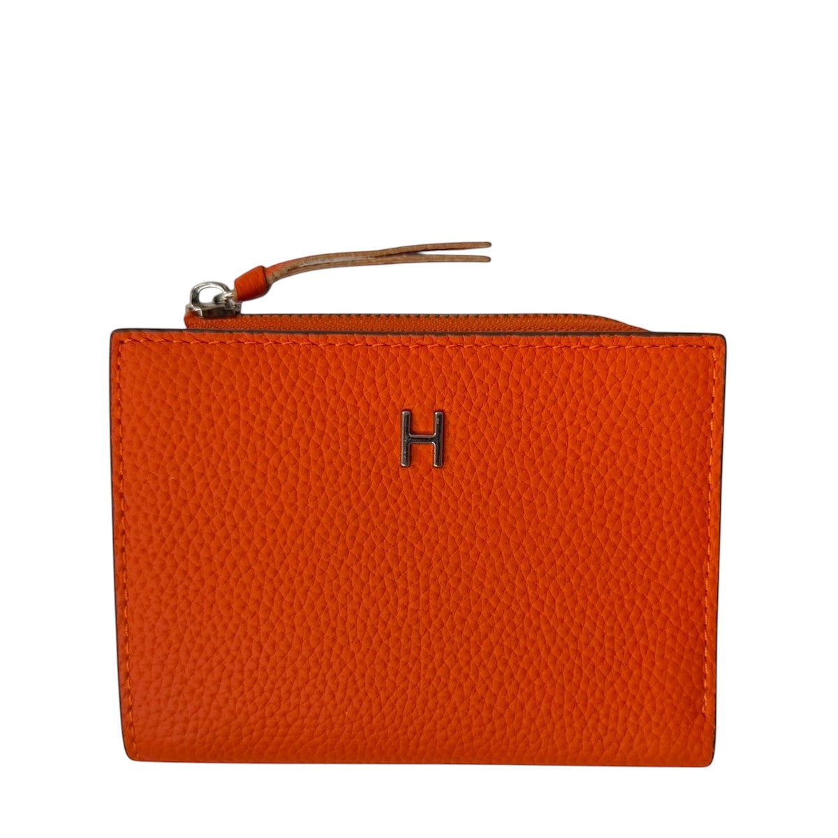 Sina Footwear orange genuine leather bi-fold wallet with zipper and H logo detail.