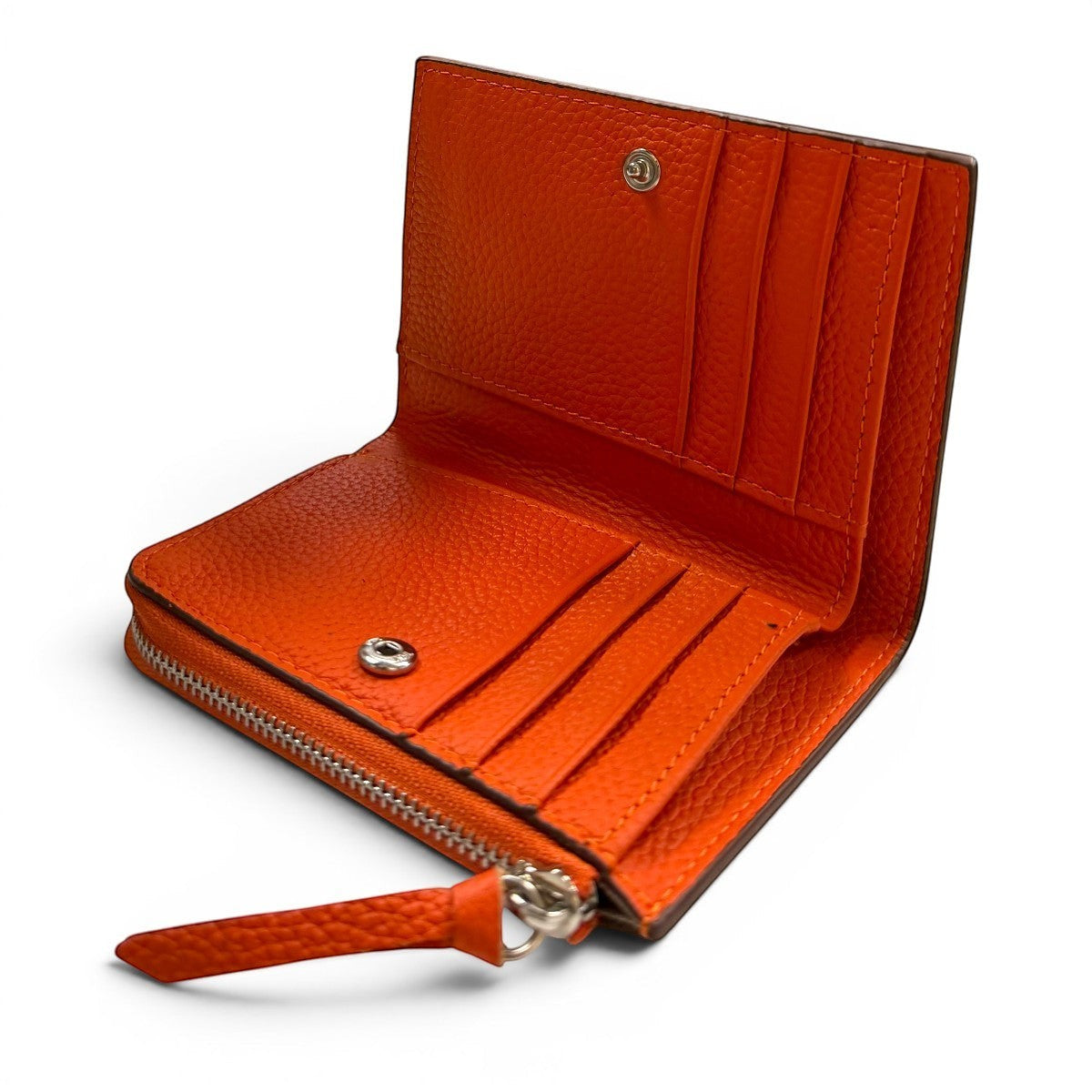Sina Footwear genuine leather bi-fold wallet in bright orange with multiple card slots and a zippered coin pocket.
