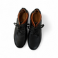 Sina Footwear Pasargad black leather lace-up sneakers with brown accents and a durable rubber outsole. Photo of upper view.