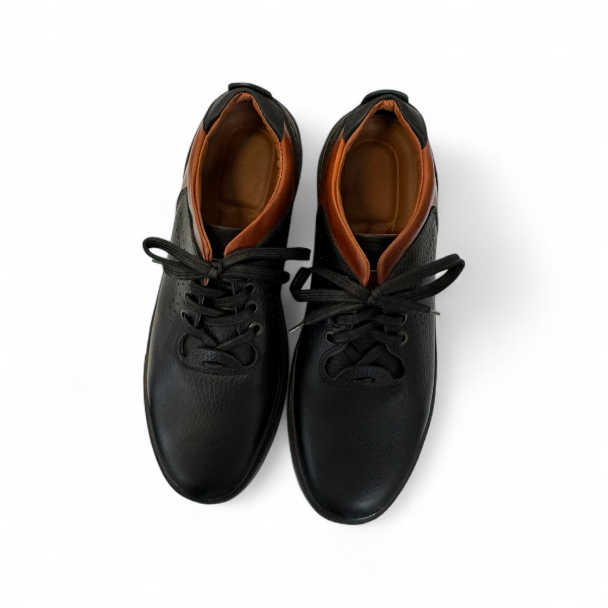 Sina Footwear Pasargad black leather lace-up sneakers with brown accents and a durable rubber outsole. Photo of upper view.