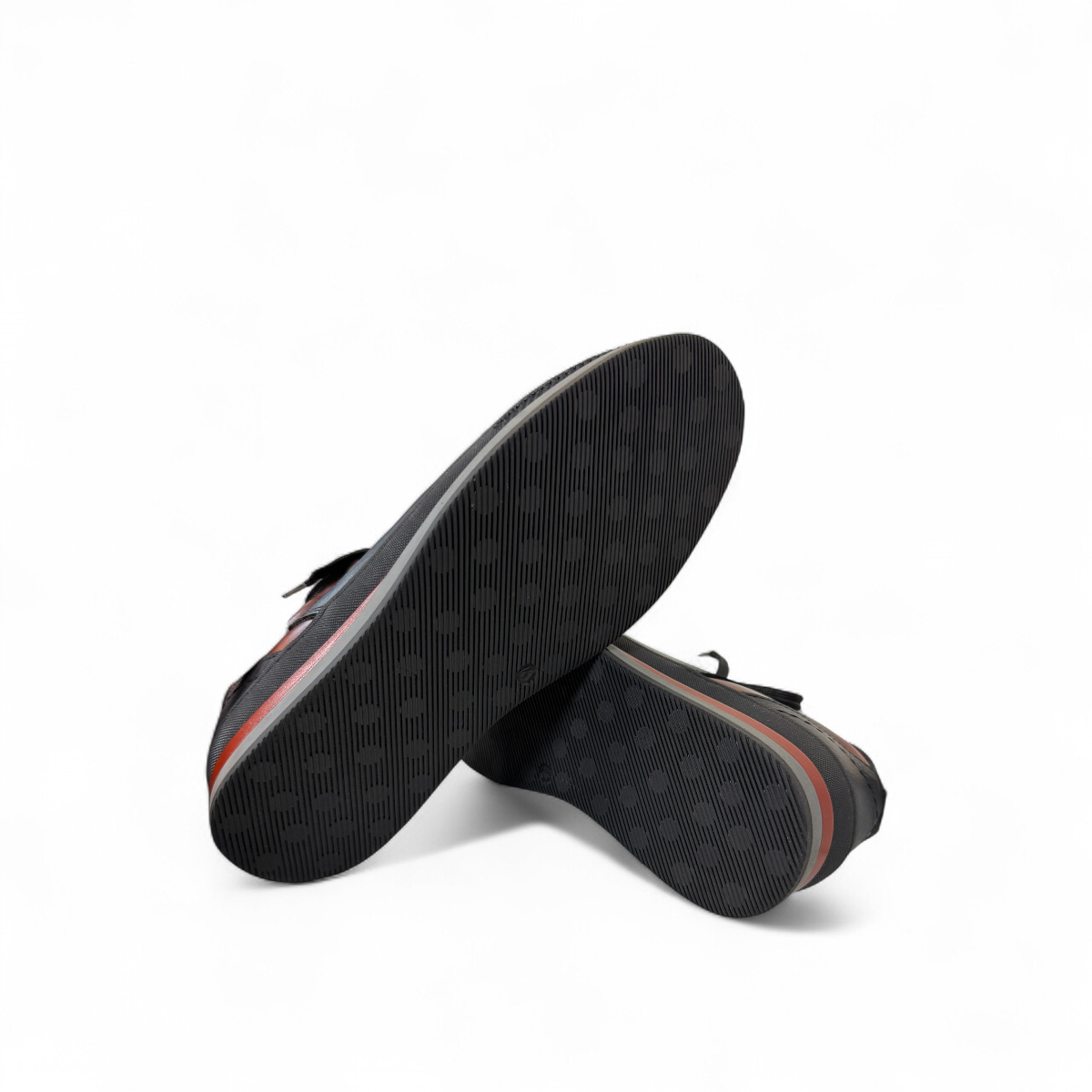 Sina Footwear Pasargad black leather lace-up sneakers with brown accents and a durable rubber outsole. Photo of bottom view.