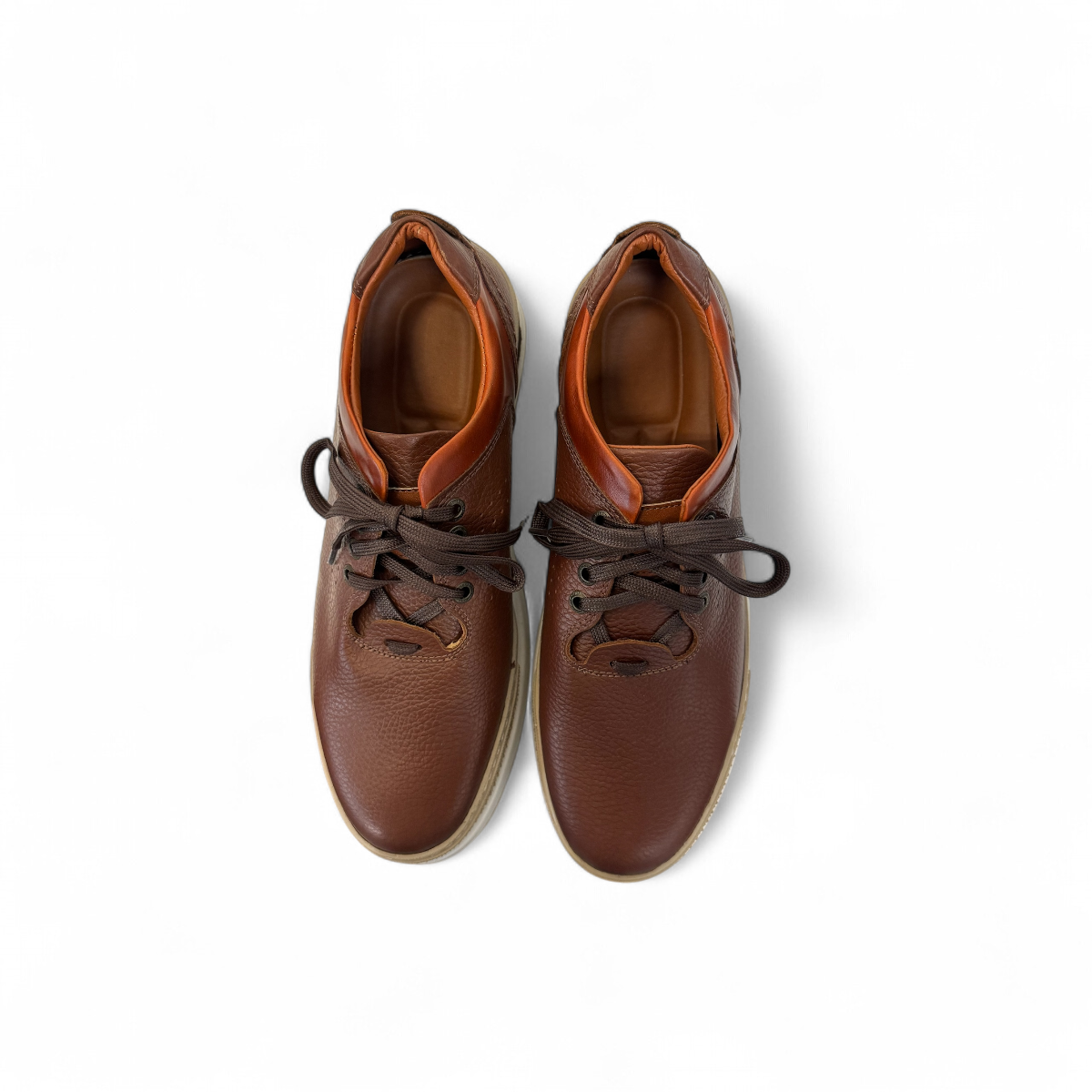 Sina Footwear Pasargad brown leather lace-up sneakers with a textured upper and durable rubber platform outsole. Photo of upper view.