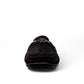Sina Footwear Poonak black suede loafers with handmade stitching and a metallic bit detail on a white background. Photo of front view 2.
