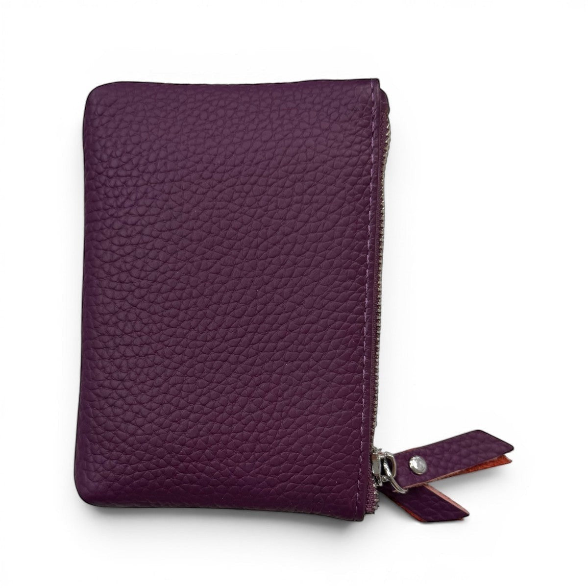 Sina Footwear genuine leather wallet in purple with zip closure and leather pull tab. Practical for cards and cash.