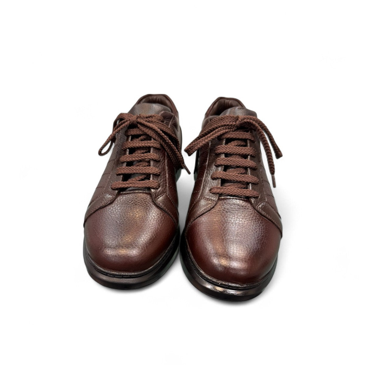 Sina Footwear Sari dark brown genuine leather lace-up shoe with a durable rubber outsole and detailed stitching. Photo of front view.