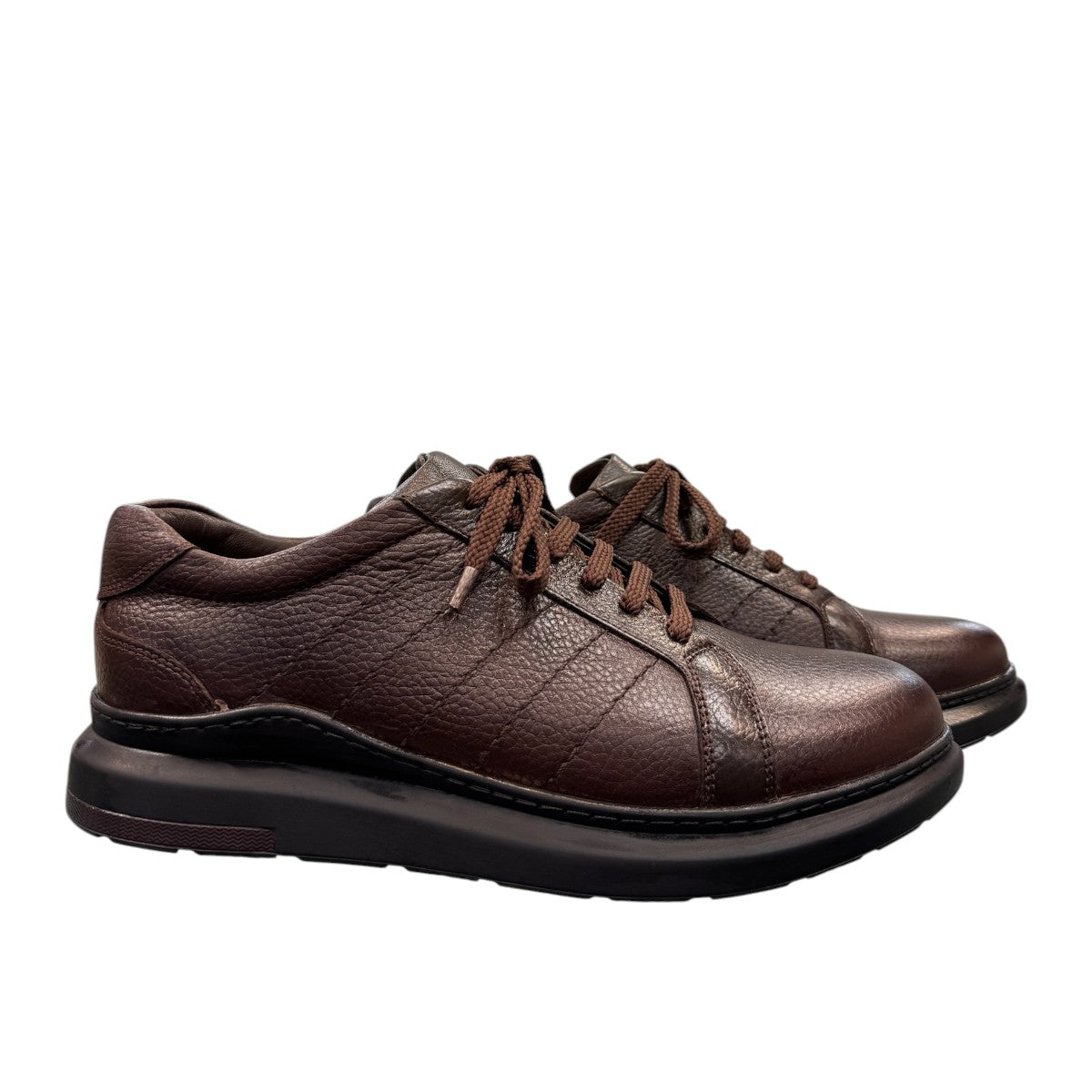 Sina Footwear Sari dark brown genuine leather lace-up shoe with a durable rubber outsole and detailed stitching. Photo of side views.