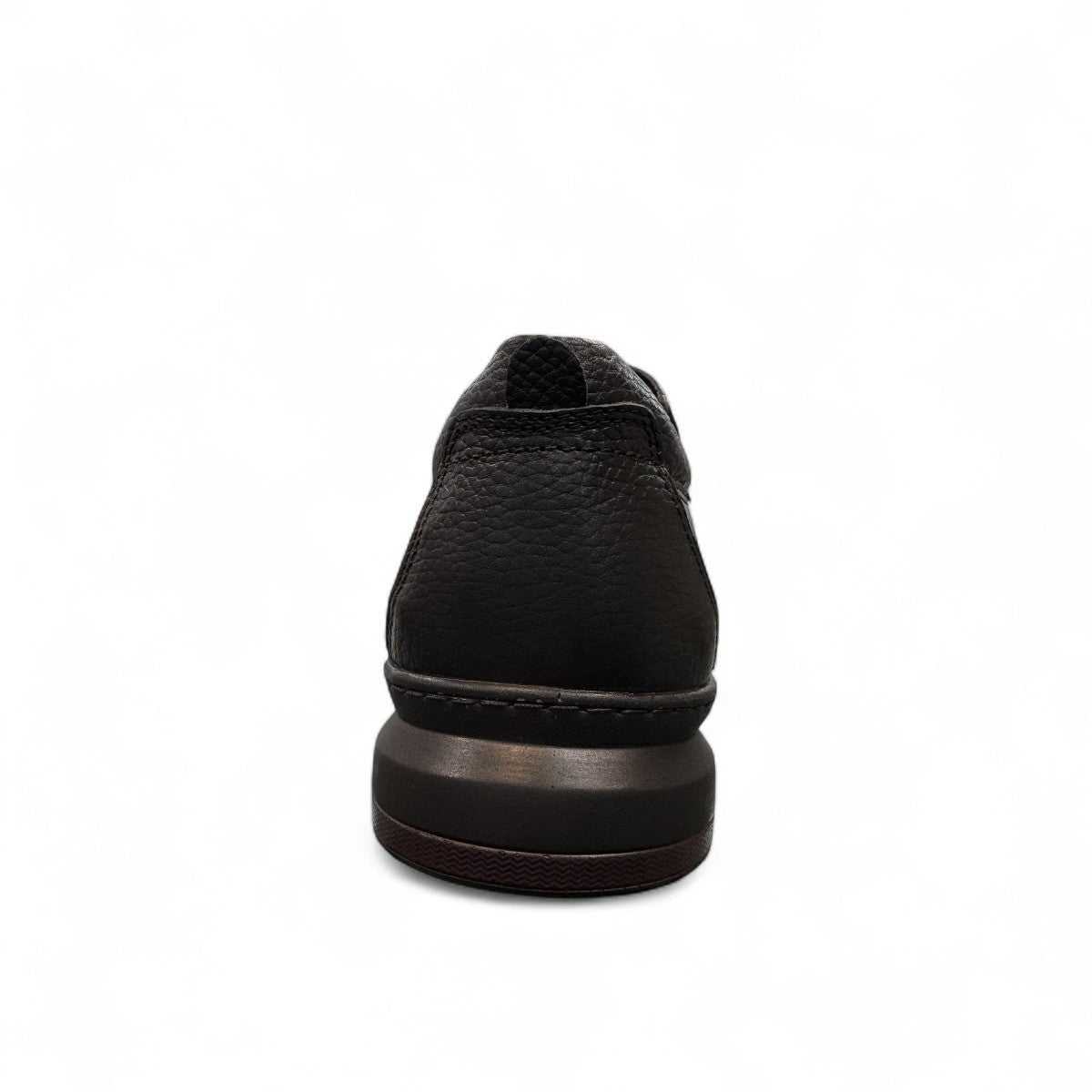 Sina Footwear Satel black genuine leather slip-on shoe with textured upper, rubber outsole, and handmade stitching. Photo of back view.