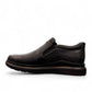 Sina Footwear Satel black genuine leather slip-on shoe with textured upper, rubber outsole, and handmade stitching. Photo of left side view.