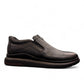 Sina Footwear Satel black genuine leather slip-on shoe with textured upper, rubber outsole, and handmade stitching. Photo of right side view.