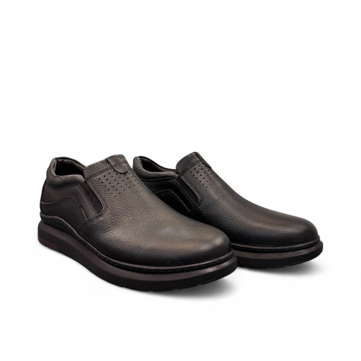 Sina Footwear Satel black genuine leather slip-on shoe with textured upper, rubber outsole, and handmade stitching. Photo of side views.