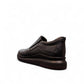 Sina Footwear Satel black genuine leather slip-on shoe with textured upper, rubber outsole, and handmade stitching. Photo of back side view.