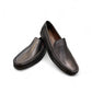 Sina Footwear Vanak black leather loafers with handmade stitching and a durable rubber outsole for formal wear. Photo of upper view.