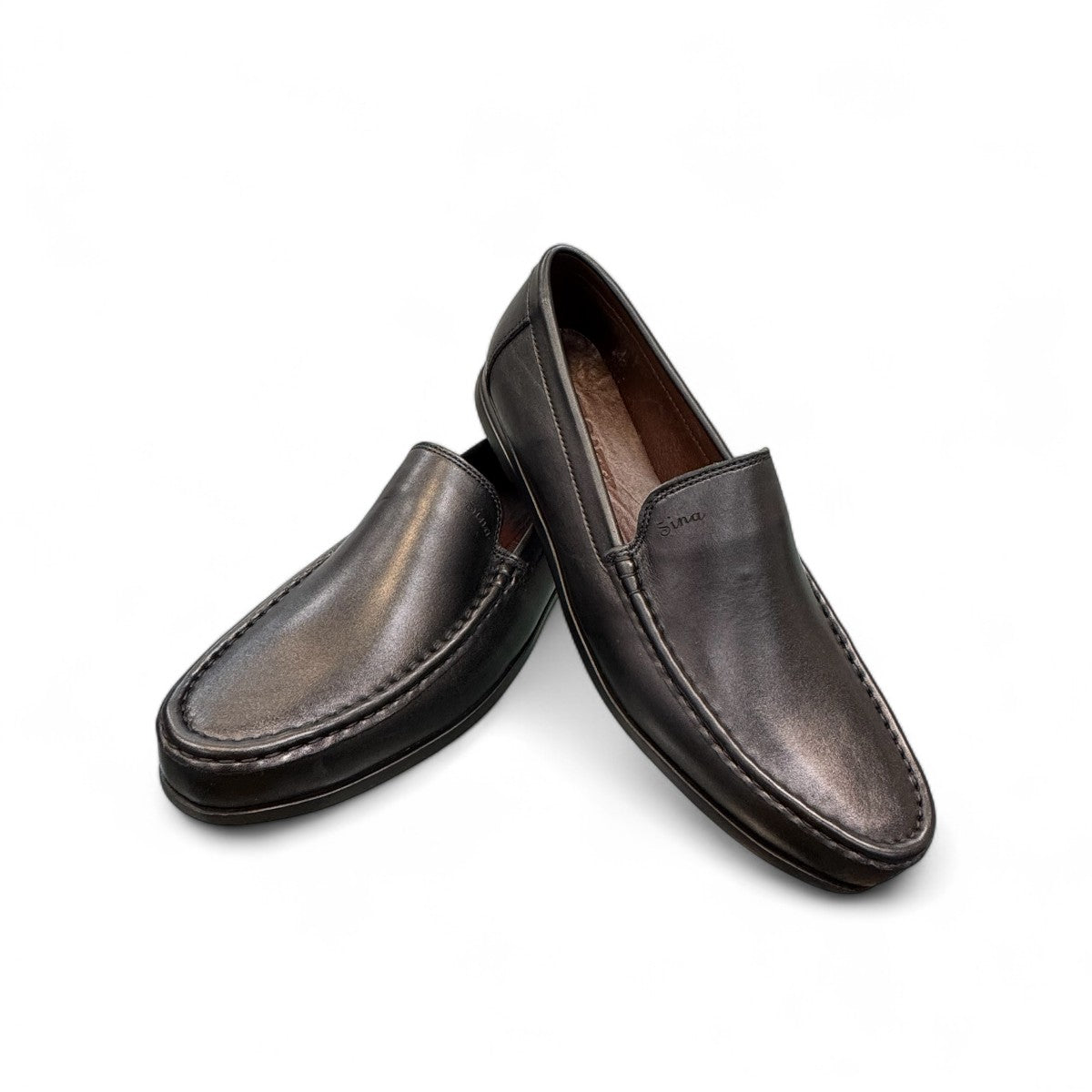 Sina Footwear Vanak black leather loafers with handmade stitching and a durable rubber outsole for formal wear. Photo of upper view.