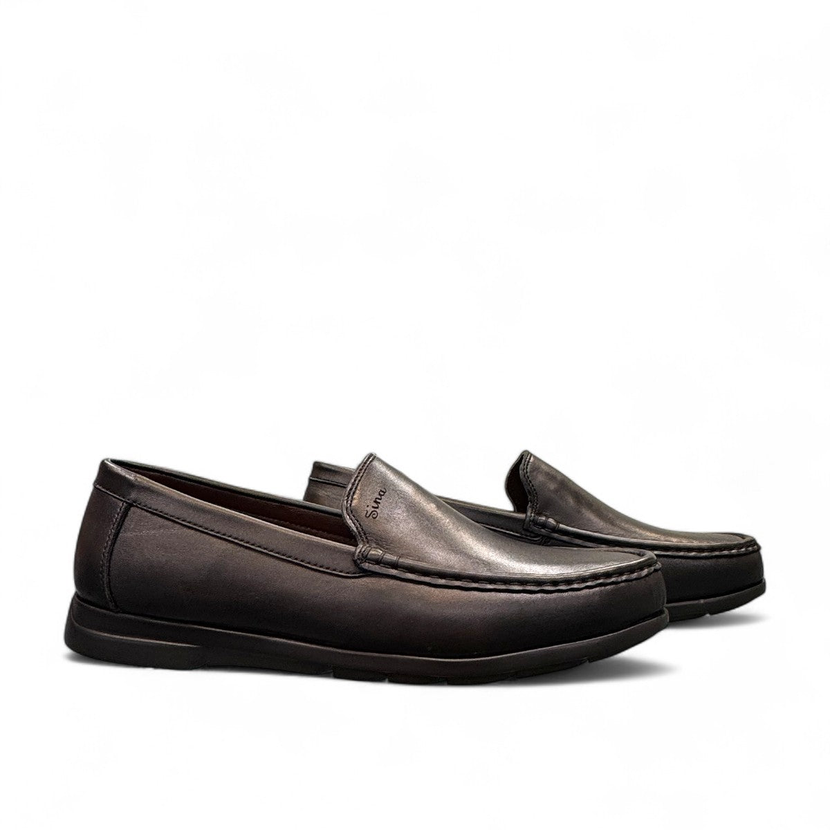 Sina Footwear Vanak black leather loafers with handmade stitching and a durable rubber outsole for formal wear. Photo of side views.