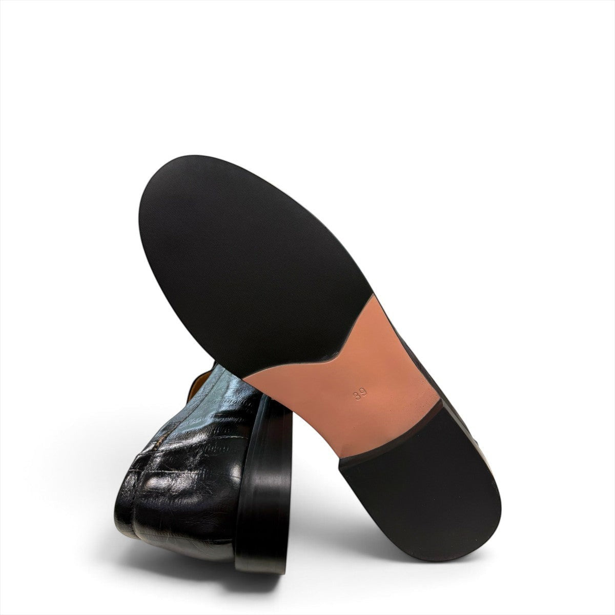 Sina Footwear wine-colored genuine leather loafer with hand-finished gathered detailing and a durable rubber outsole.
photo of the bottom side