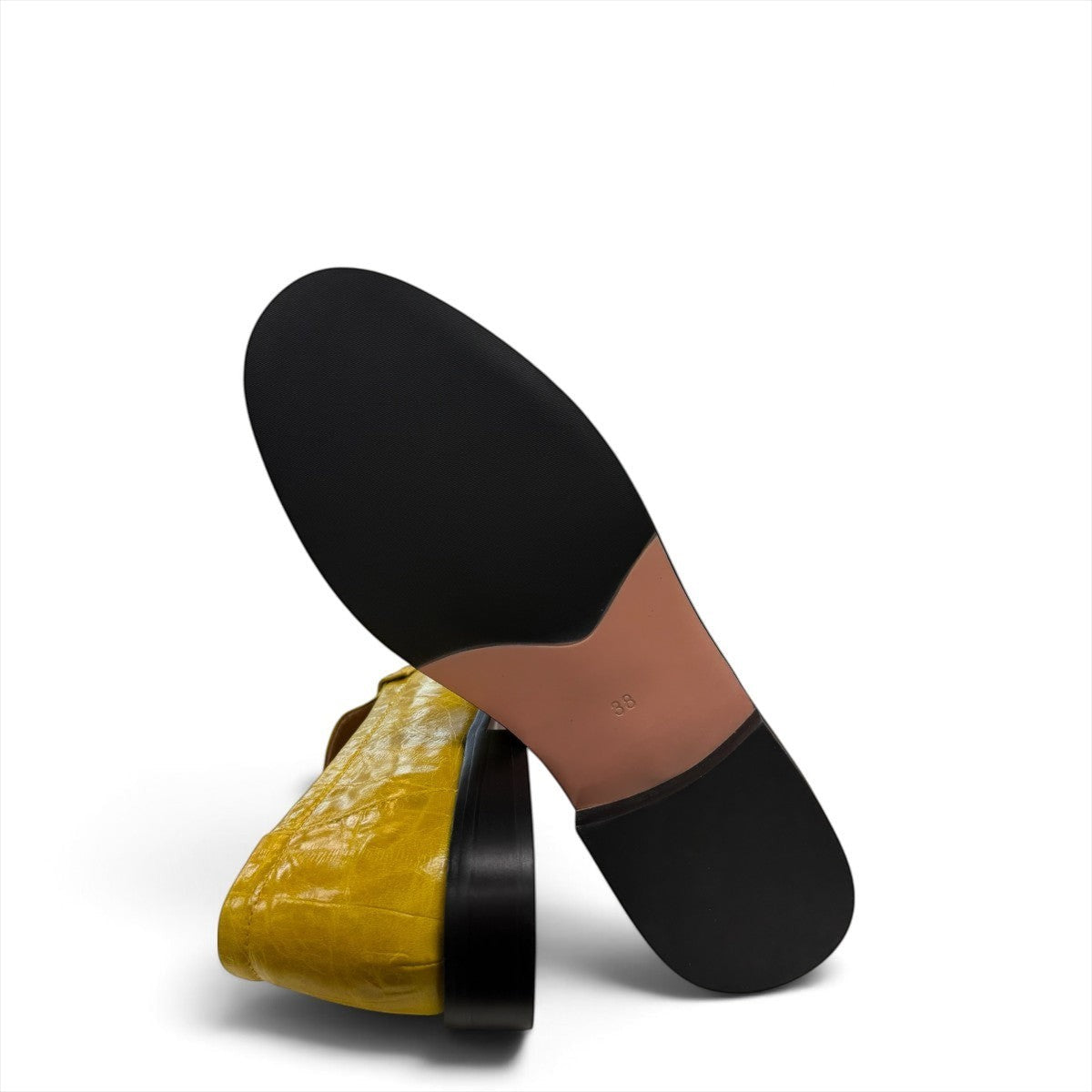 Sina Footwear yellow genuine leather loafer with hand-finished gathered detailing and a durable rubber outsole.
photo of the bottom side