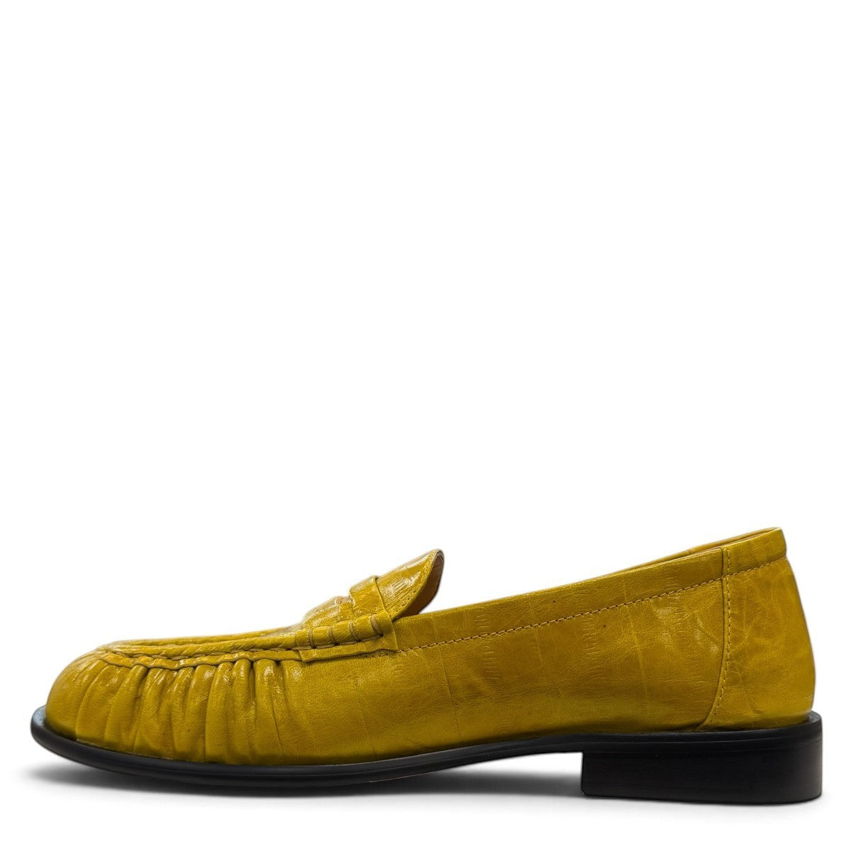 Sina Footwear yellow genuine leather loafer with hand-finished gathered detailing and a durable rubber outsole.
photo of the left side