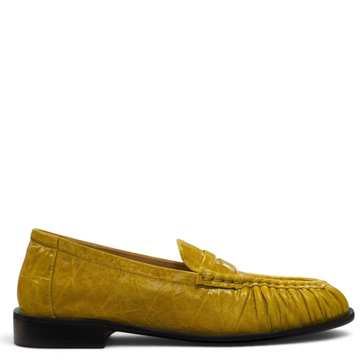 Sina Footwear yellow genuine leather loafer with hand-finished gathered detailing and a durable rubber outsole.
photo of the right side