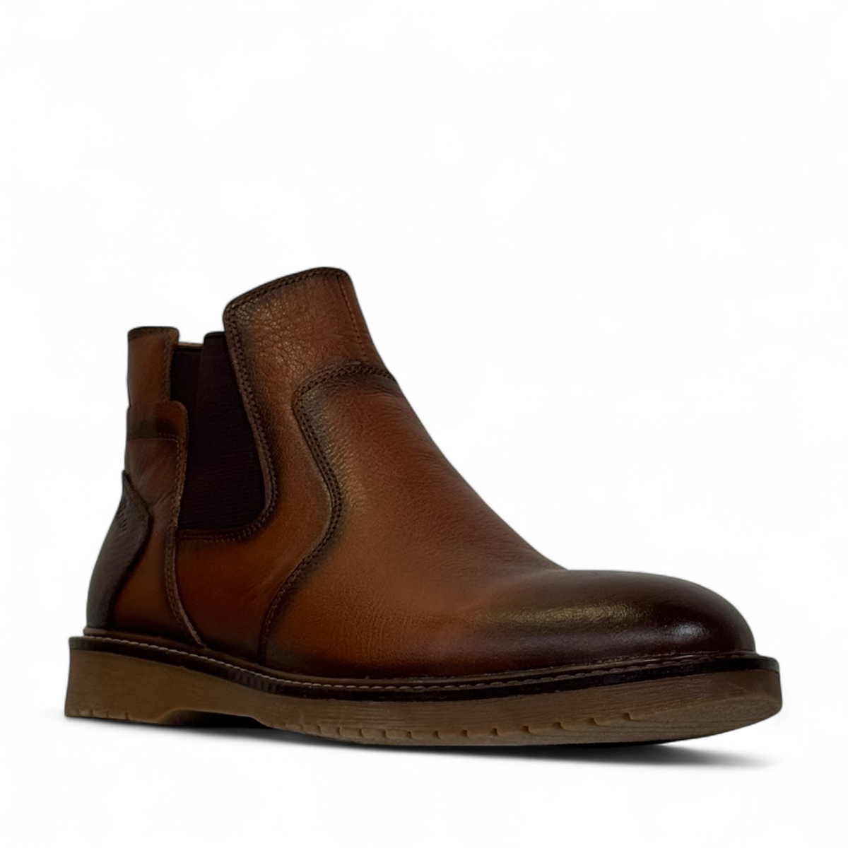 Sina Footwear Zagros brown leather boot with elastic side panels, handmade stitching, and rubber outsole. Photo of front side view.