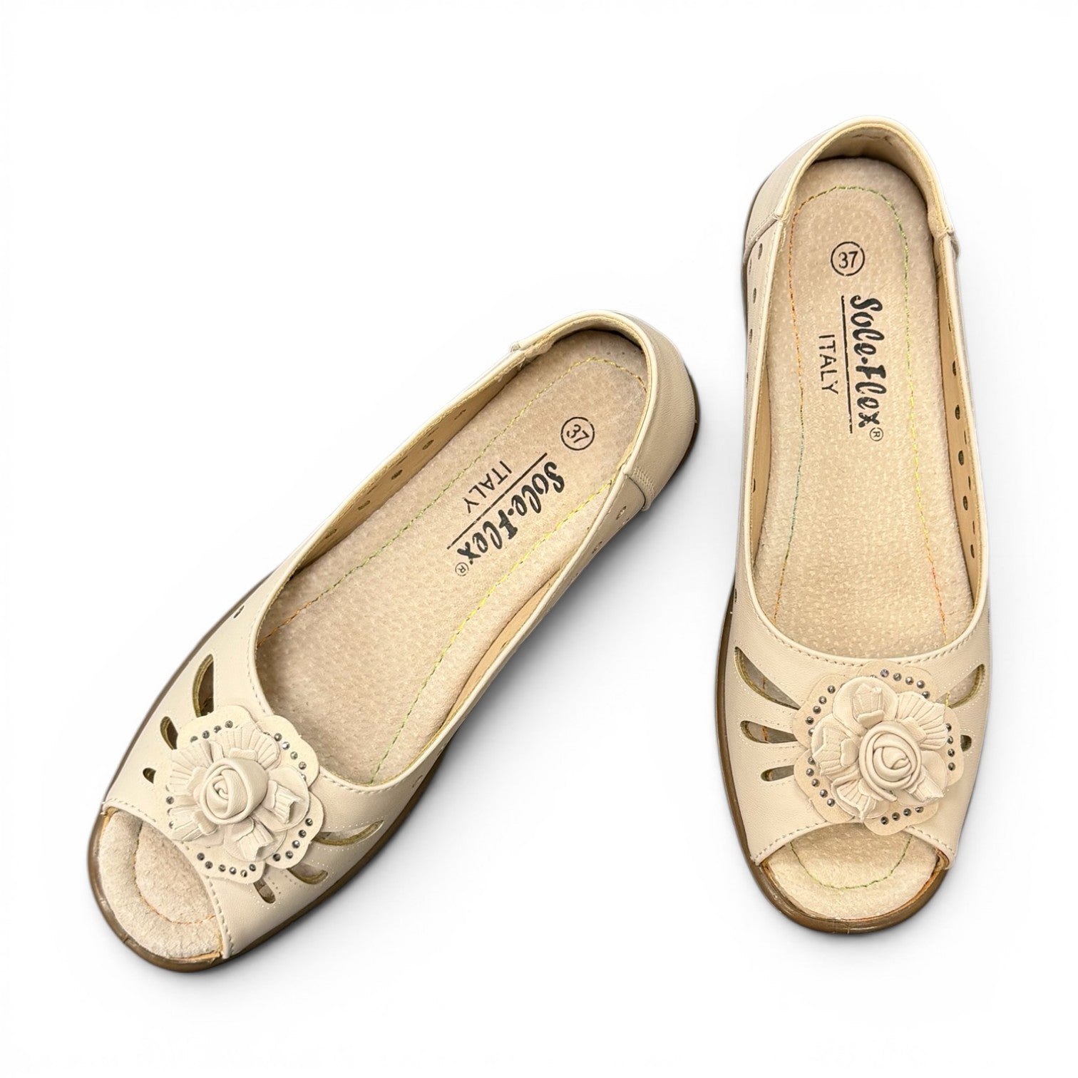 soflex-S230 beige peep-toe comfort flats with floral detail and breathable side perforations on a low wedge sole.
photo of the top side