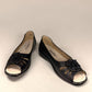 soflex-S230 black peep-toe comfort flats with floral detail, side perforations, and a flexible low-profile sole.
photo of the front side