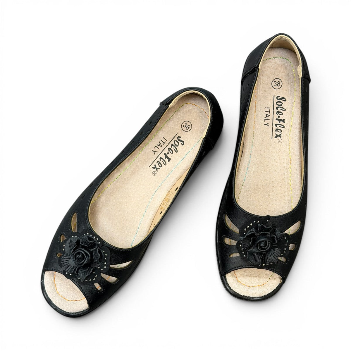 soflex-S230 black peep-toe comfort flats with floral detail, side perforations, and a flexible low-profile sole.
photo of the top side