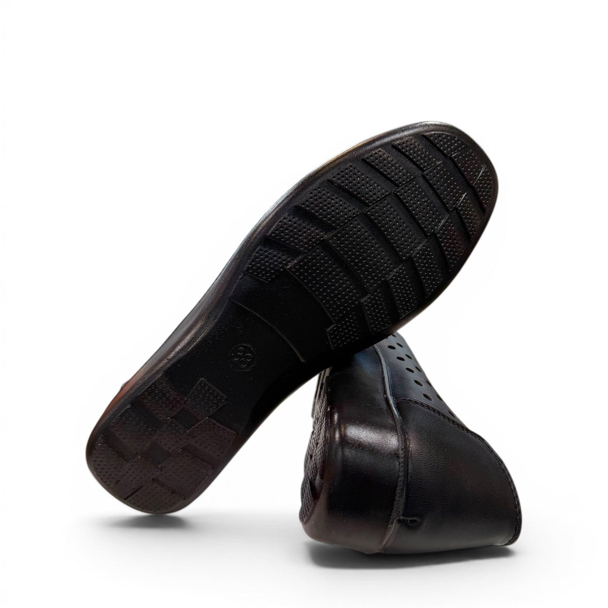 soflex-S230 black peep-toe comfort flats with floral detail, side perforations, and a flexible low-profile sole.
photo of the bottom side