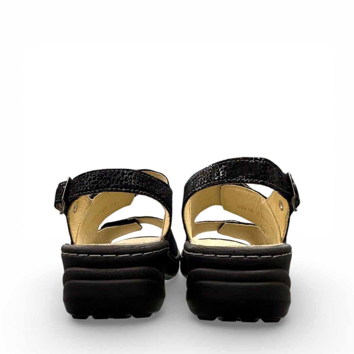 softline black leather Hedi wedge sandals with shiny finish, adjustable velcro straps, and decorative buckle.
photo of the back side
