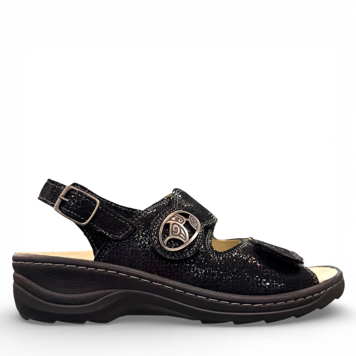softline black leather Hedi wedge sandals with shiny finish, adjustable velcro straps, and decorative buckle.
photo of the right side