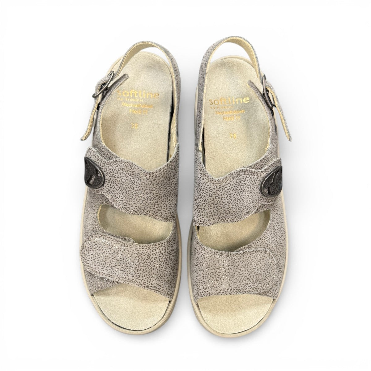 Softline Hedi sandals in umbra leather with a shiny textured finish, wedge heel, and adjustable straps.
photo of the top side