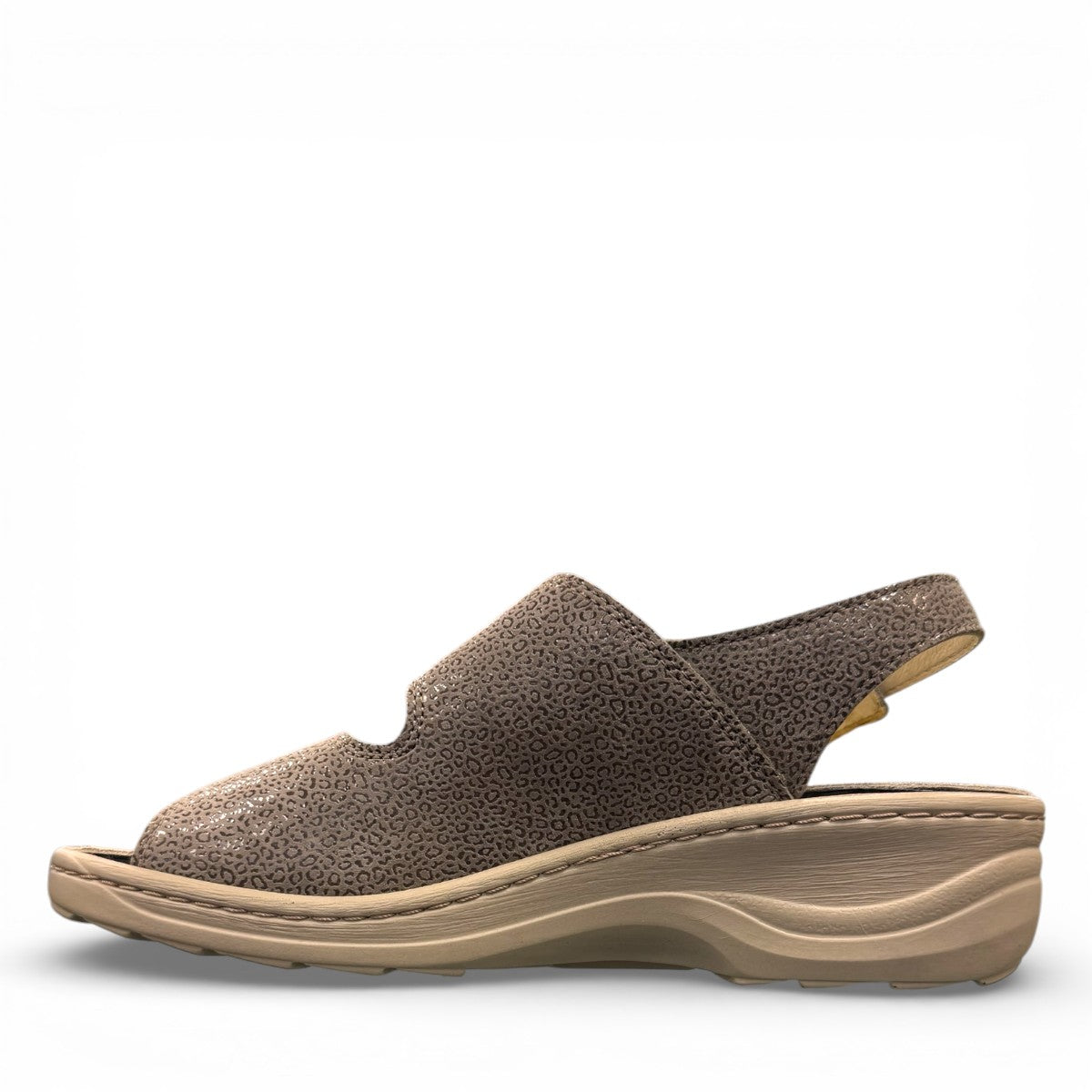 Softline Hedi sandals in umbra leather with a shiny textured finish, wedge heel, and adjustable straps.
photo of the left side